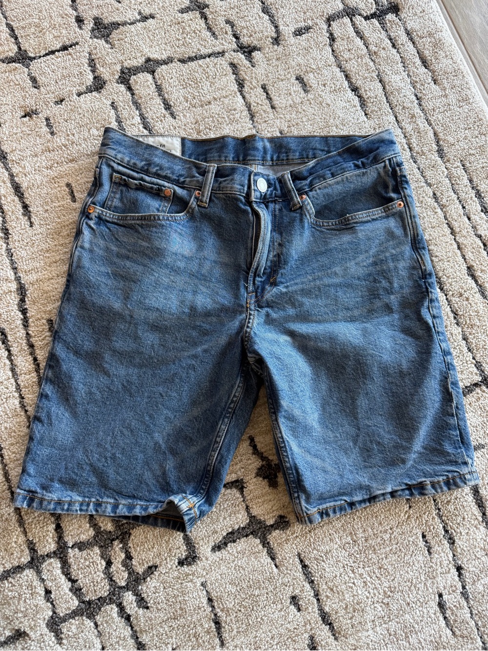 Men’s H&M denim shorts in a classic medium-blue wash